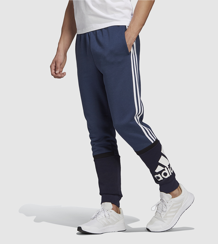 Adidas essentials logo cuffed pants online