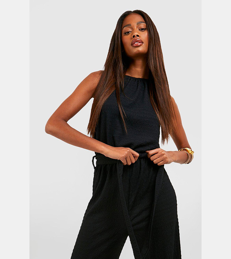 Black halter neck clearance jumpsuits