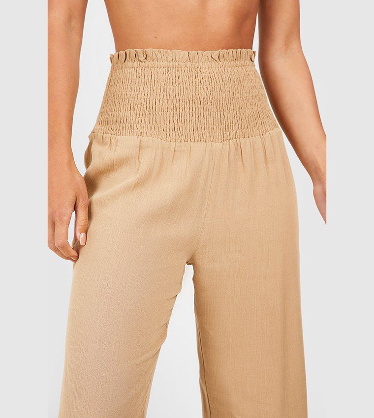 Buy Boohoo Crinkle Shirred Waistband Beach Trousers In Beige