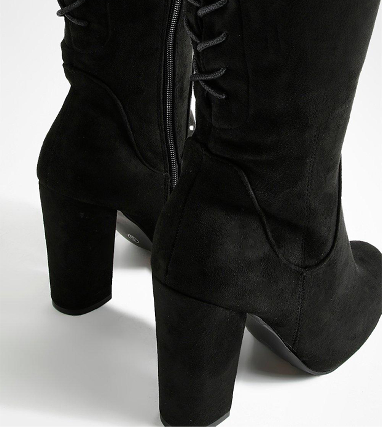 Over the knee outlet block heel