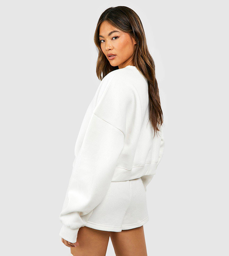 Buy Boohoo Cropped Deep Hem Sweatshirt In White 6thStreet Oman