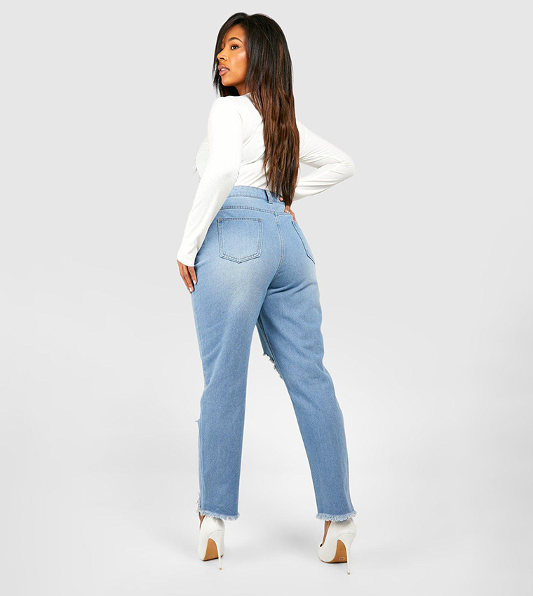 Mid blue high rise mom fit ripped jeans hotsell