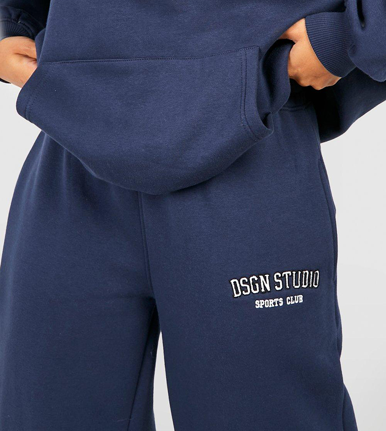 Buy Boohoo Design Studio Applique Straight Fit Joggers In Navy