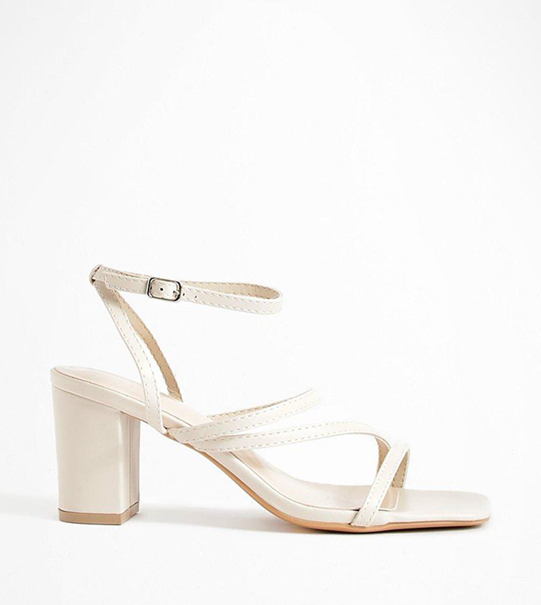 Buy Boohoo Asymmetric Multi Strap Block Heels In Ecru 6thStreet UAE