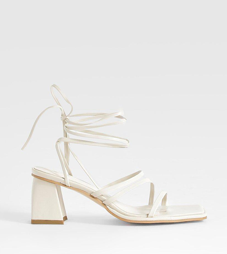 Buy Boohoo Low Block Strappy Tie Up Sandals In White 6thStreet Bahrain