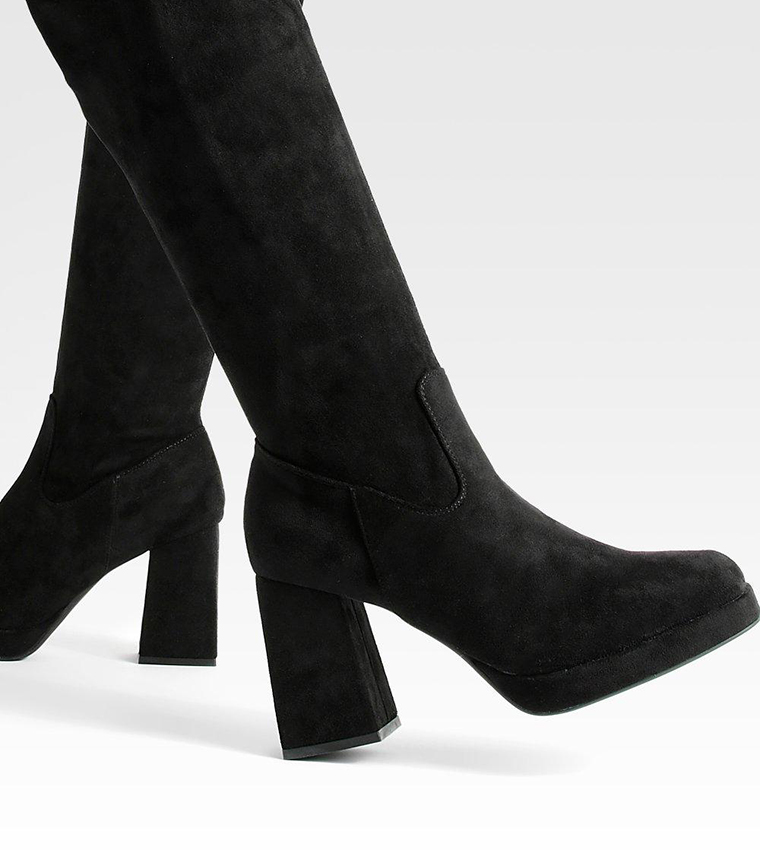 Over the knee outlet block heel