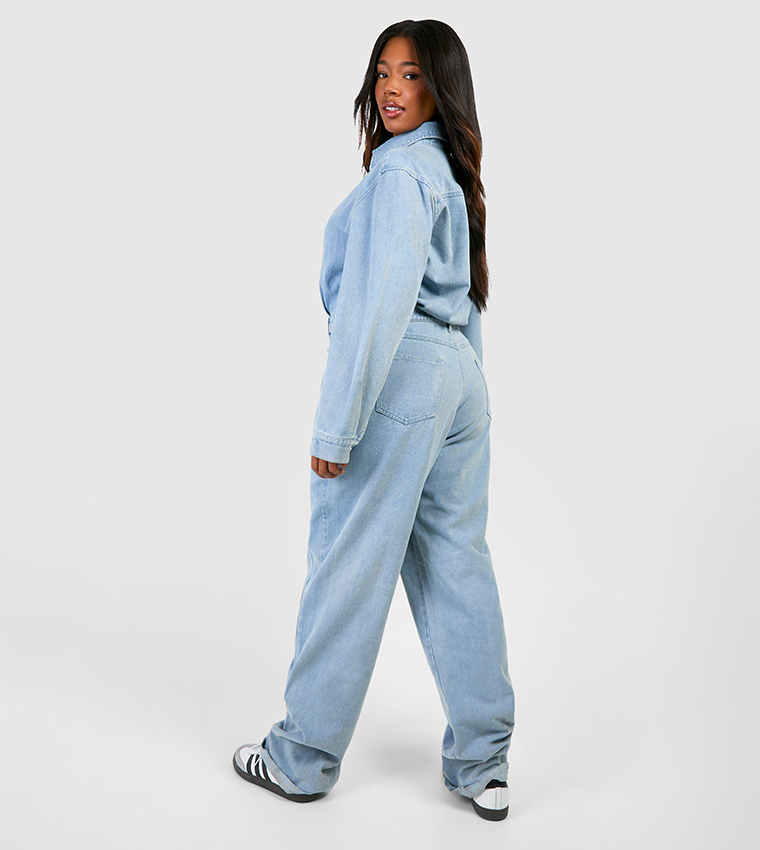 Buy Boohoo Curve Washed Roll Hem Denim Jumpsuit In Blue | 6thStreet UAE