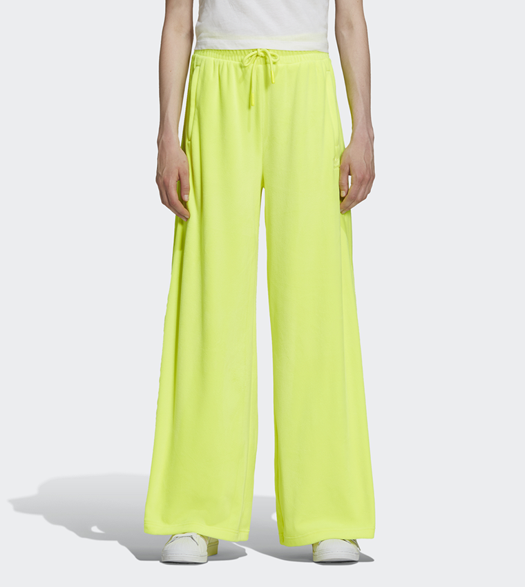 Buy Adidas Jeremy Scott Track Pants In Green 6thStreet Saudi Arabia