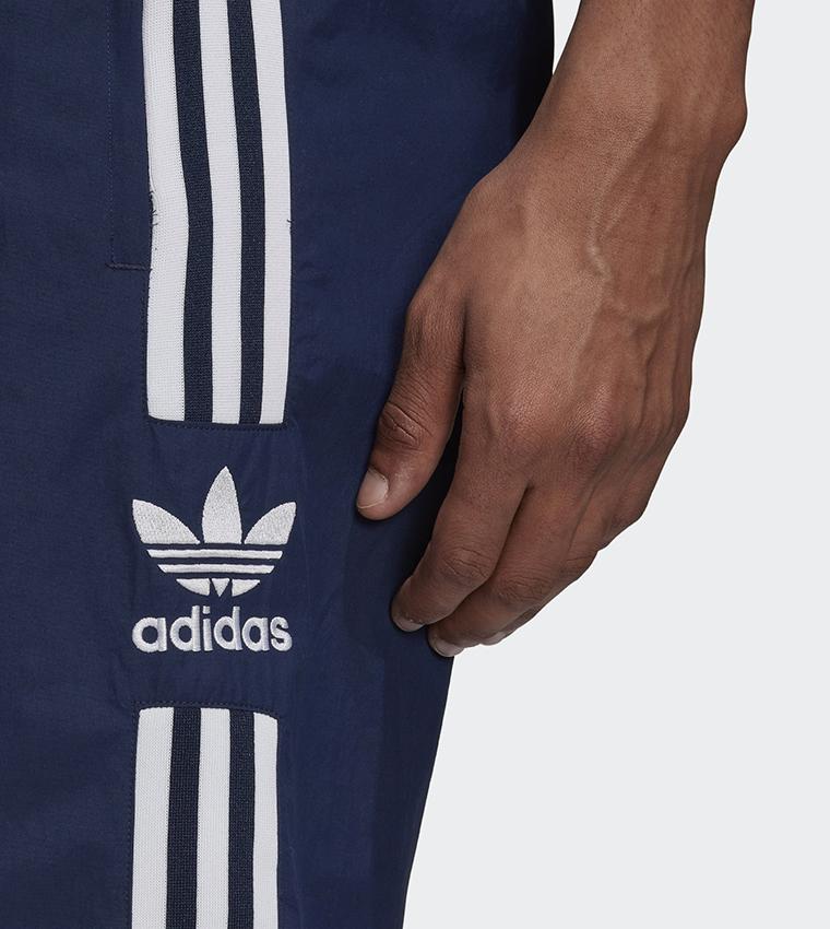 Buy Adidas Adicolor Classics Lock Up Trefoil Tracksuit Bottoms In Blue ...