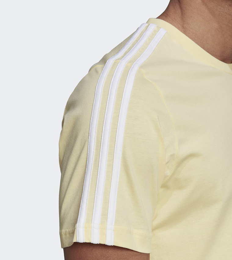 Buy Adidas Essentials Stripes T Shirt In Yellow 6thStreet Qatar