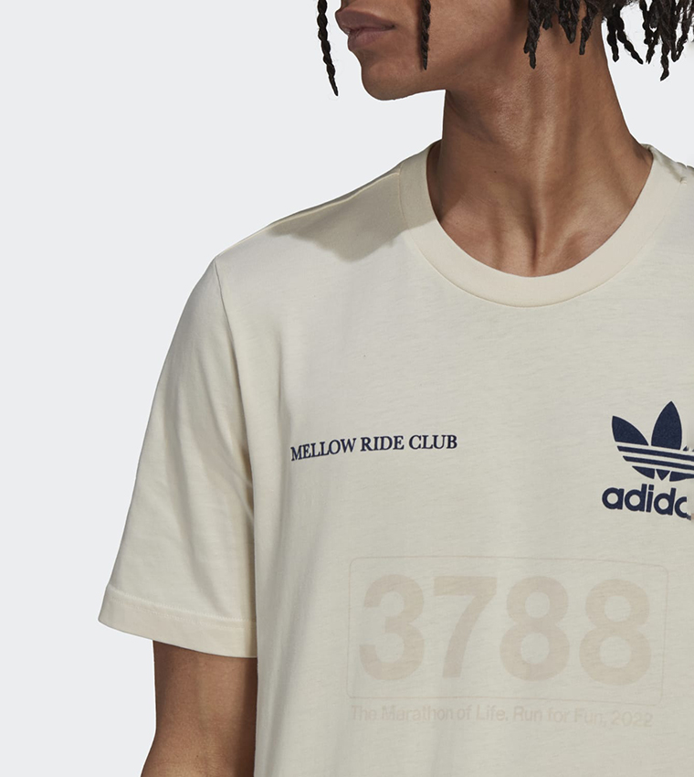 Buy Adidas Graphics Mellow Ride Club Crew Neck T Shirt In Off