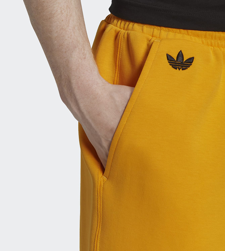 Buy Adidas Adicolor Neuclassics Shorts In Yellow 6thStreet UAE