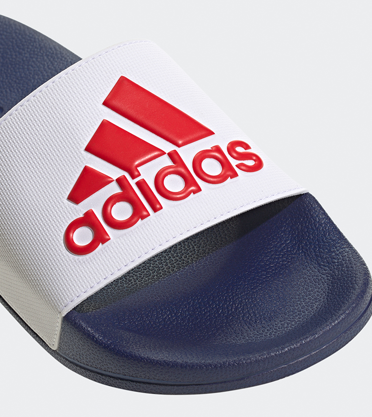 ADILETTE SHOWER Logo Detail Slides