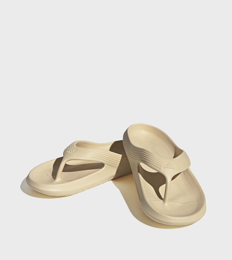 Buy Adidas ADICANE Textured Flip Flops In Beige 6thStreet Bahrain