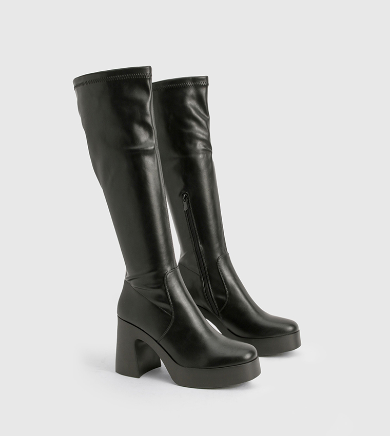 flared heel knee high boots