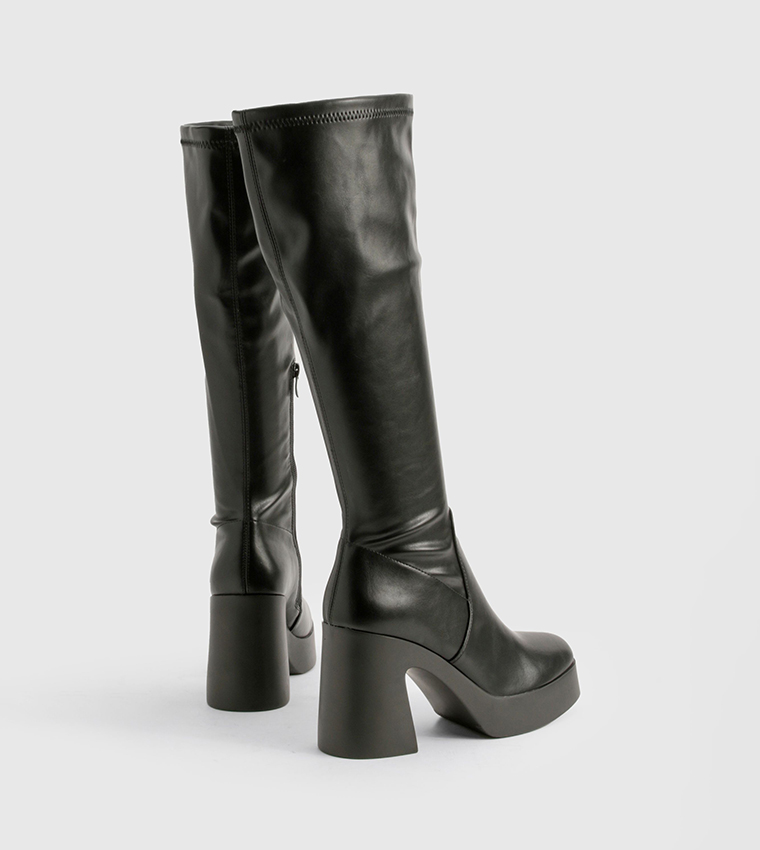 flared heel knee high boots