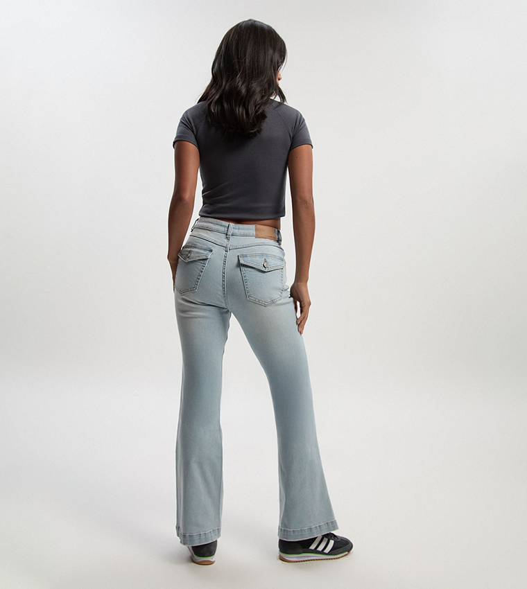 Petite Mid Rise Faded Flared Jeans