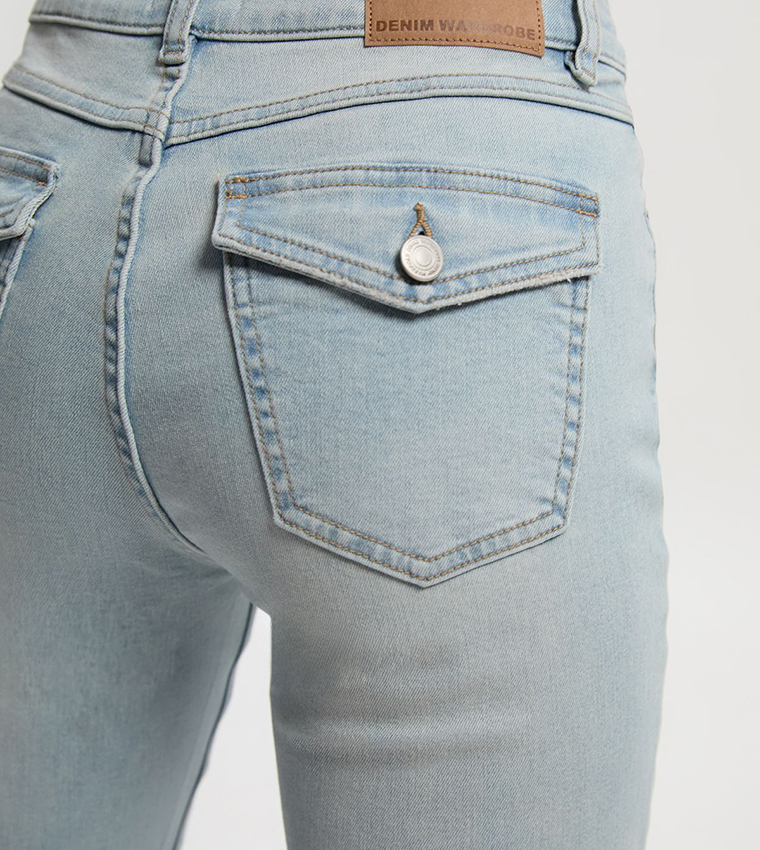 Petite Mid Rise Faded Flared Jeans