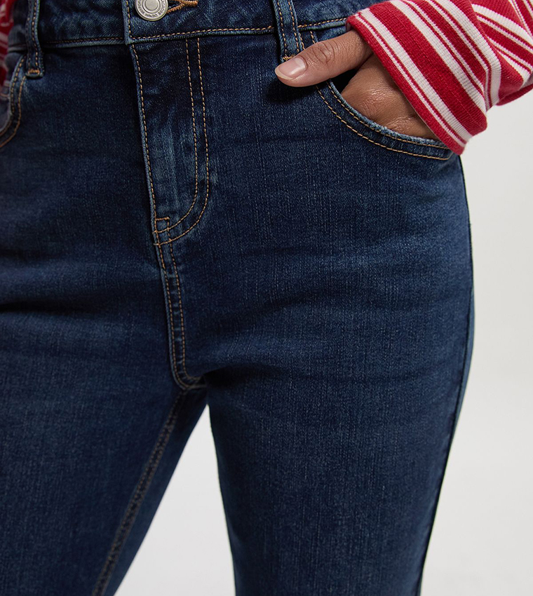 Petite Mid Rise Flared Jeans