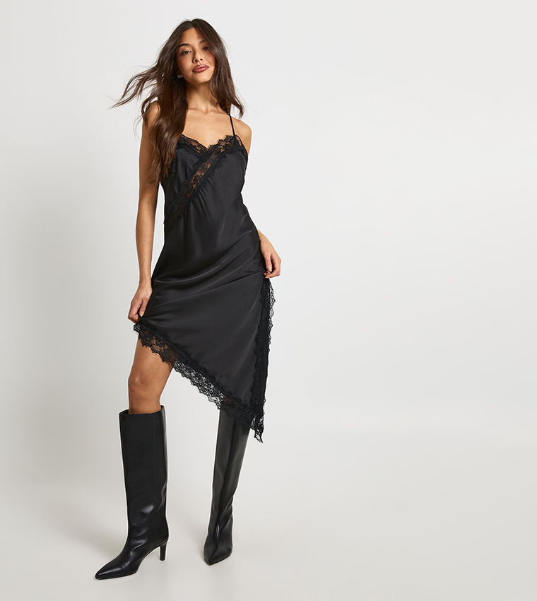 what does asymmetrical dress mean Asymmetrical Ruched Sleeveless Midi Dress  Victoria Lane