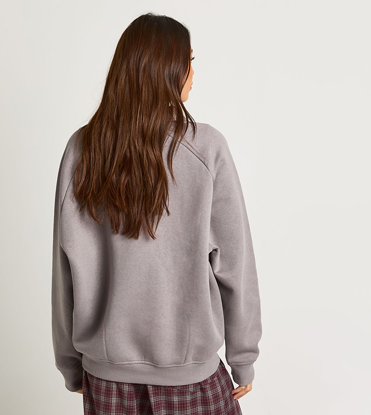 سويتشيرت اوفرسايز مغسول 