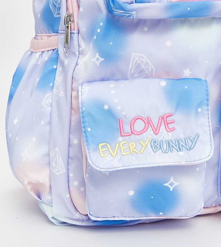 شنطة ظهر بجيوب وطبعة 