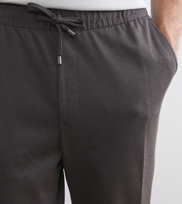 Solid Mid Rise Slim Fit Trousers