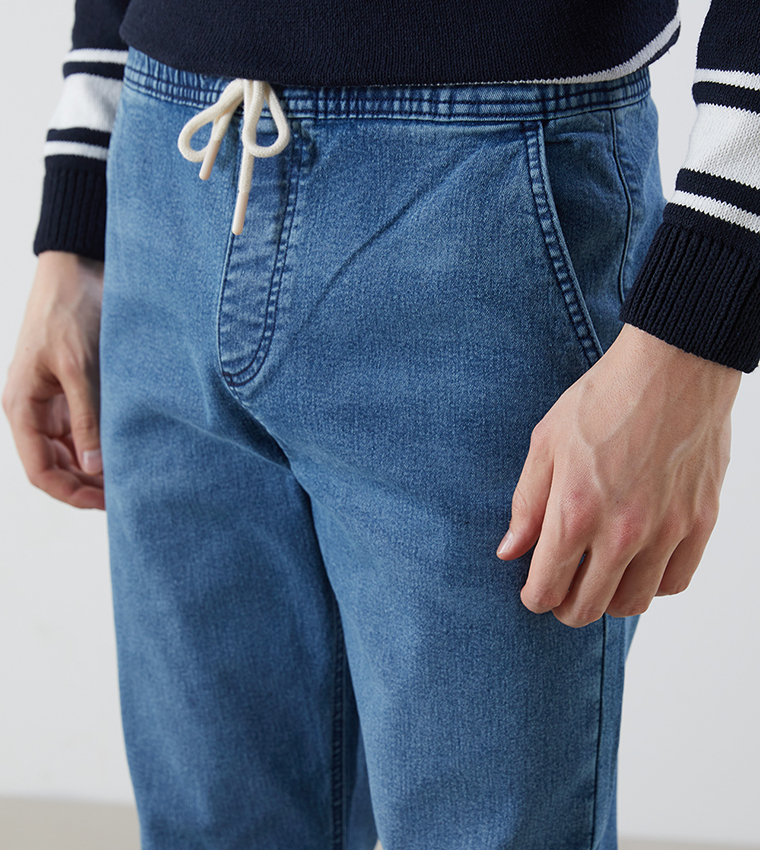 780 Washed Slim Fit Jogger Jeans