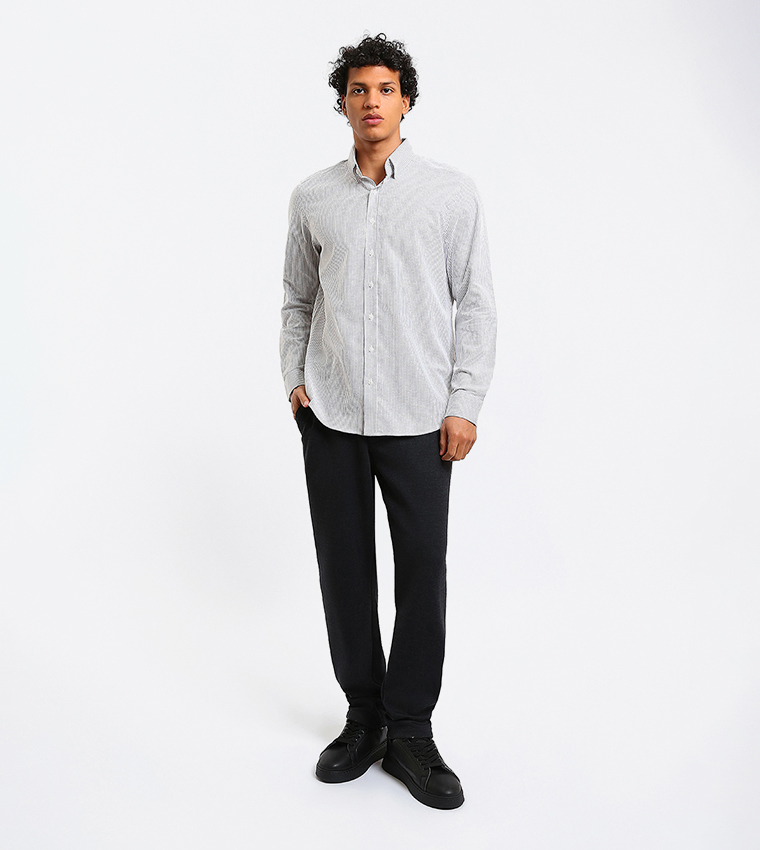 بنطلون رجالي بخصر متوسط وقصة ضيقة