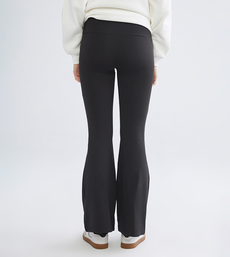 Solid Elastic Waist Flared Leggings