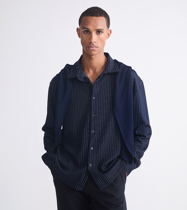 قميص مخطط كم طويل