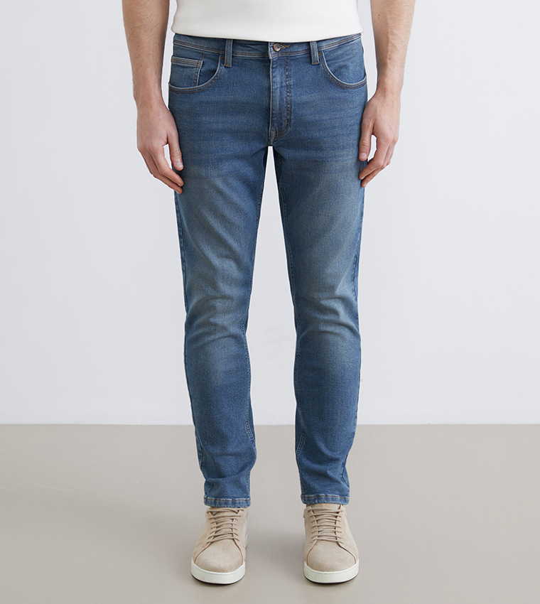 بنطلون جينز رجالي 750 مغسول بخصر متوسط وقصة ضيقة