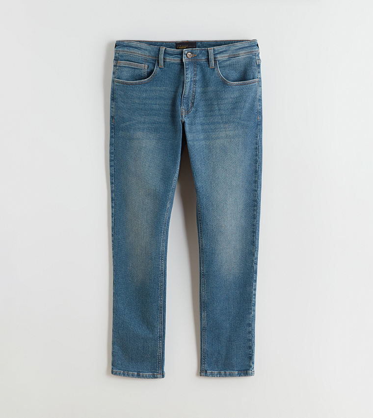 بنطلون جينز رجالي 750 مغسول بخصر متوسط وقصة ضيقة