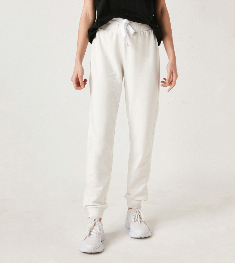 Cream track pants deals