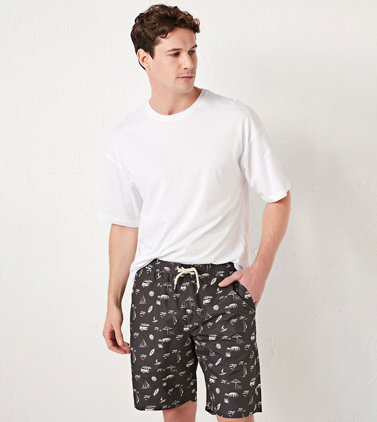 Buy LC Waikiki Below Knee Patterned Swim Shorts In Black