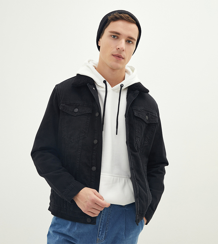 Black denim jacket store with grey hoodie