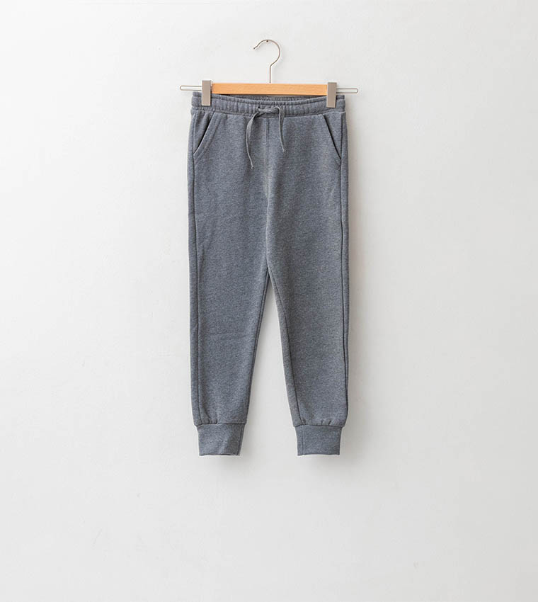 Buy LC Waikiki Basic BoyS Jogger Sweatpants With Elastic Waist In Grey 6thStreet UAE