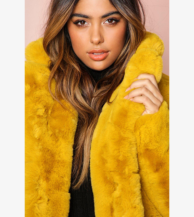 Mustard fur coat on sale