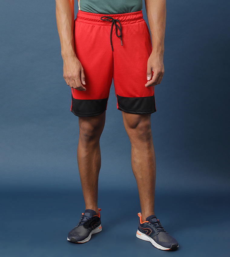 Mid Rise Active Short Buy HIS & HERS Solid Mid Rise Active Shorts In Red | 6thstreet Qatar