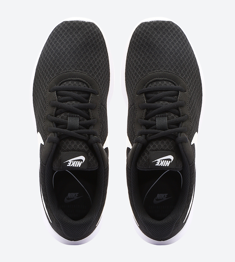 Buy Nike Tanjun Trainers Black NIKE812655 011 In Black | 6thStreet Qatar