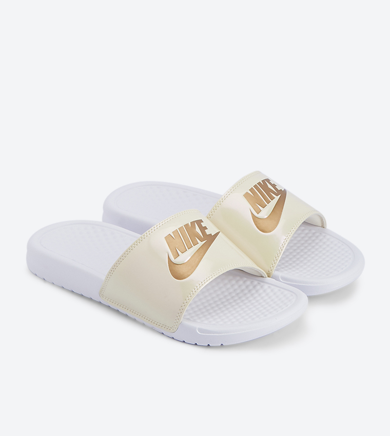 Buy Nike Benassi Just Do It Printed Sheen Slides White NK618919 112 In White 6thStreet UAE