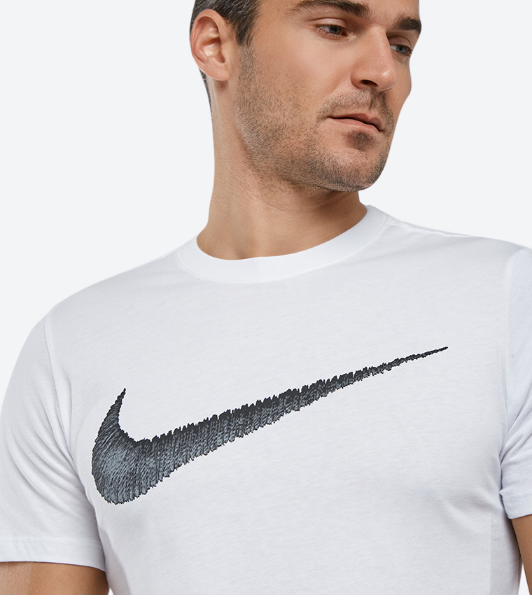 Buy Nike Hangtag Swoosh Printed Short Sleeve T Shirt White NK707456 100 In White 6thStreet Oman