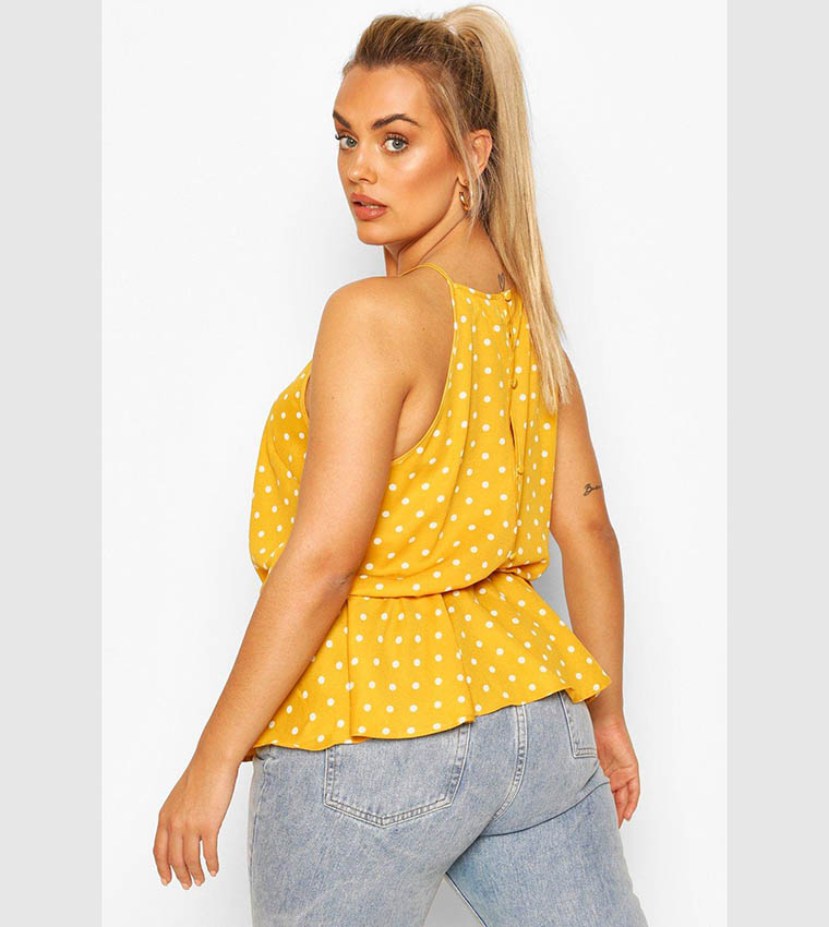 Buy Boohoo Polka Dot Peplum Cami Top In Yellow 6thStreet Oman