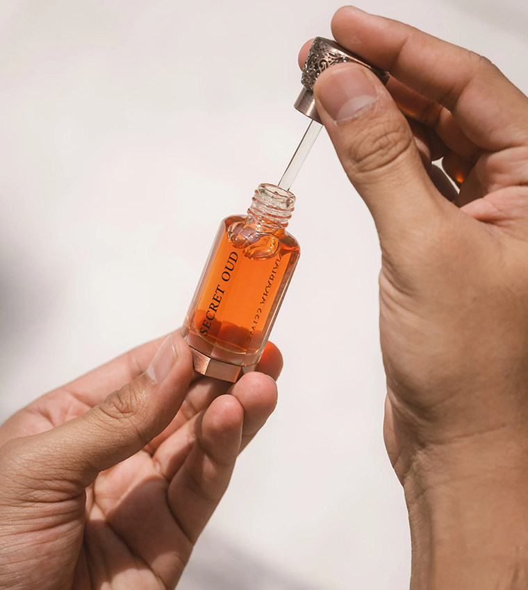 عطر سيكريت عود الدهني - ١٢ مل