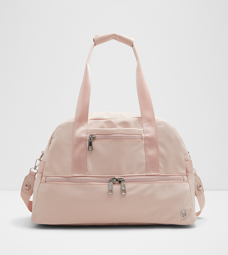 Buy Aldo SCOUTIE Solid Zippered Duffle Bag In Pink 6thStreet Saudi Arabia