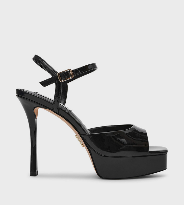 REKINDLE Ankle Strap Heel Sandals