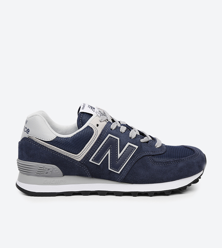 Navy and pink new balance 574 on sale